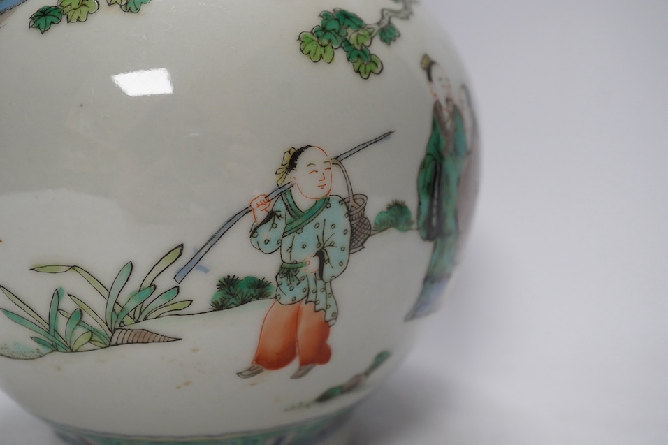 A Chinese famille verte bottle vases, Kangxi mark but later, 25.5cm. Condition - good.